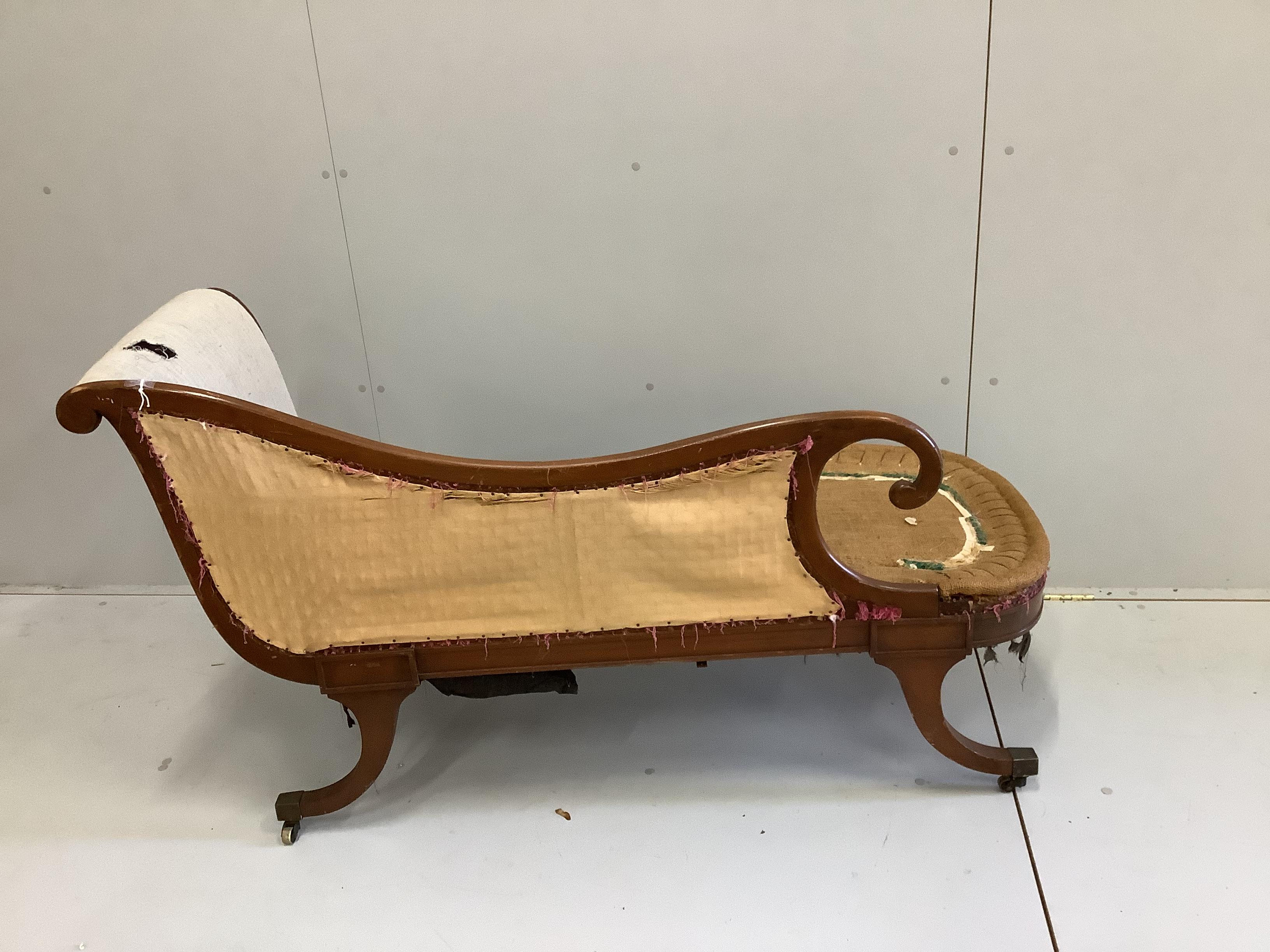 A Regency style mahogany chaise longue, length 150cm, depth 54cm, height 77cm, (needs re-upholstering)